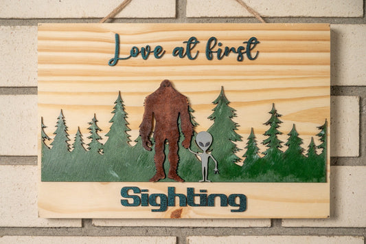 Love at first sighting wall decor -Bigfoot and Alien holding hands-Paranormal wall sign